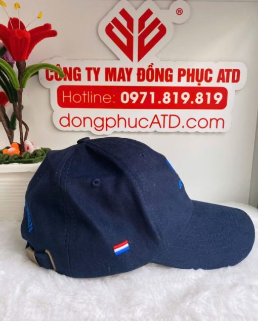 113 Non dong phuc mau xanh than De Hues 1